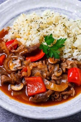 Japanese beef hayashi rice with garlic butter rice topped with fresh parsley