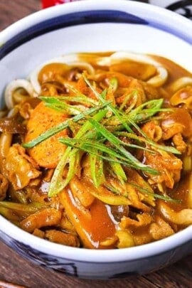Japanese curry udon topped with chopped spring onions
