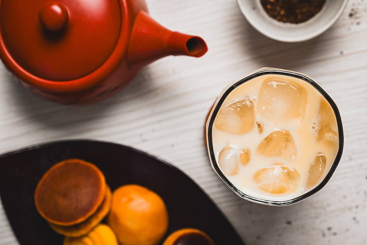 iced hojicha latte with wagashi (Japanese sweets) and Japanese style teapot