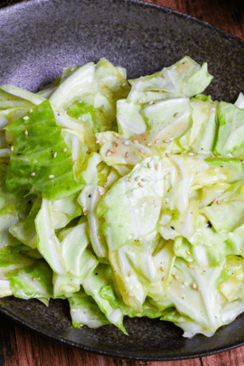 shiodare cabbage in a black bowl on wooden surface